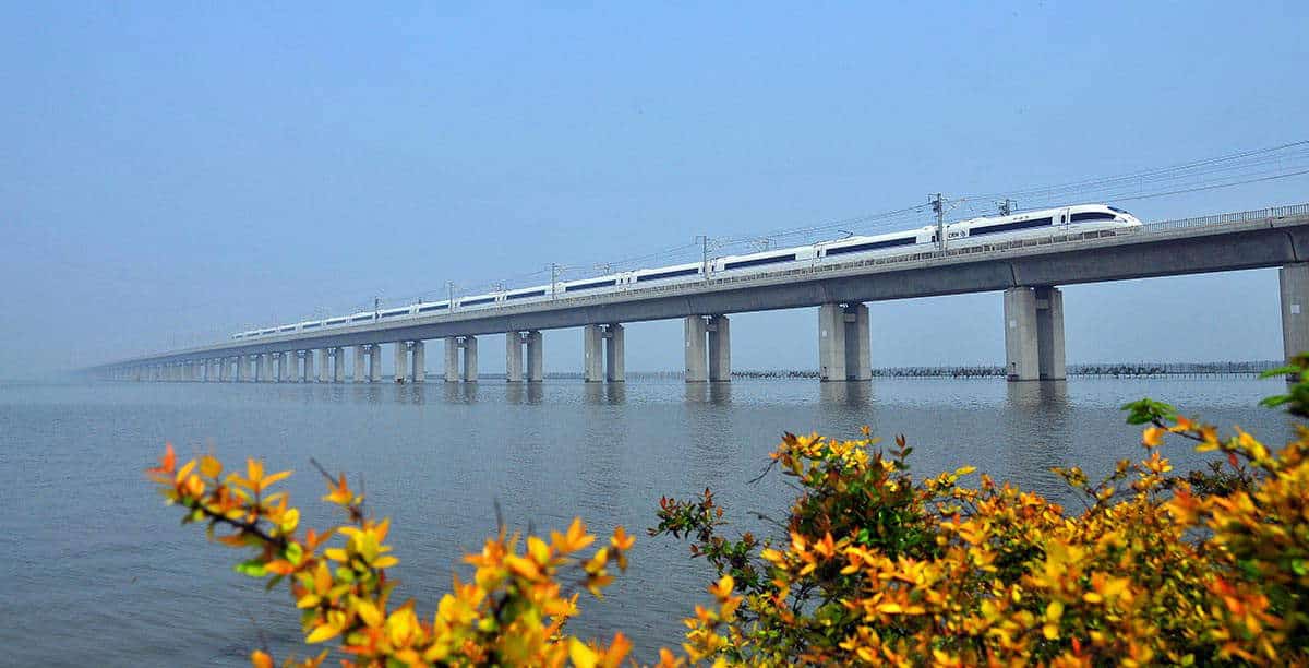 A train speeding along China’s Danyang-Kunshan Bridge. Source: Tree Hugger