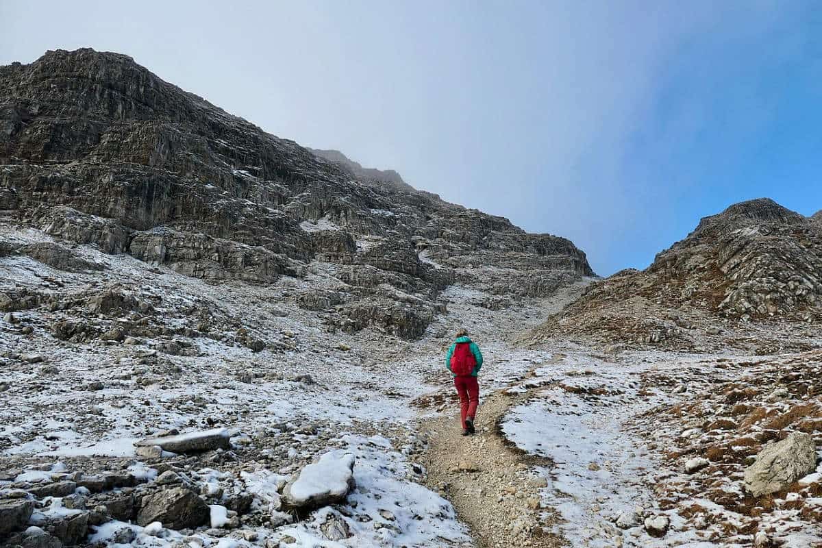 hiker in the dolomites italy